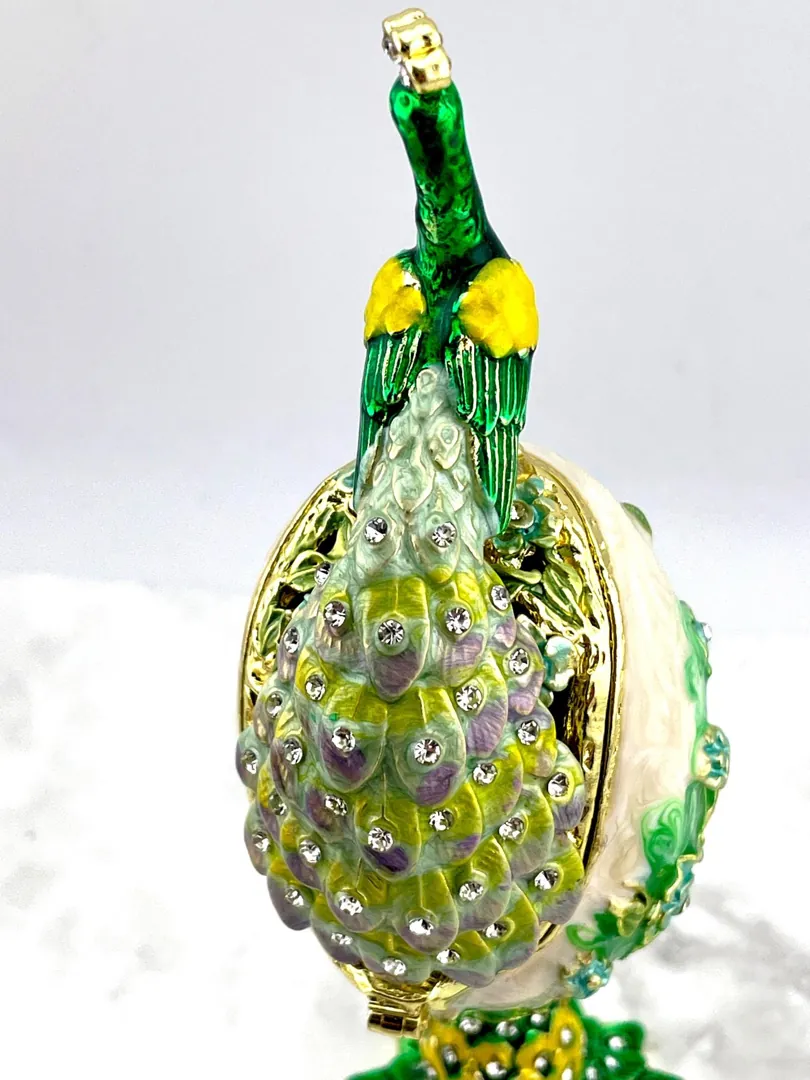 PEACOCK  Designr Green Faberge Easter Eggs in the Russian Faberge style, featuring Swarovski elements and pure gold decoration. This handmade piece makes a perfect graduation luck gift for your daughter by Pierre Lorren.