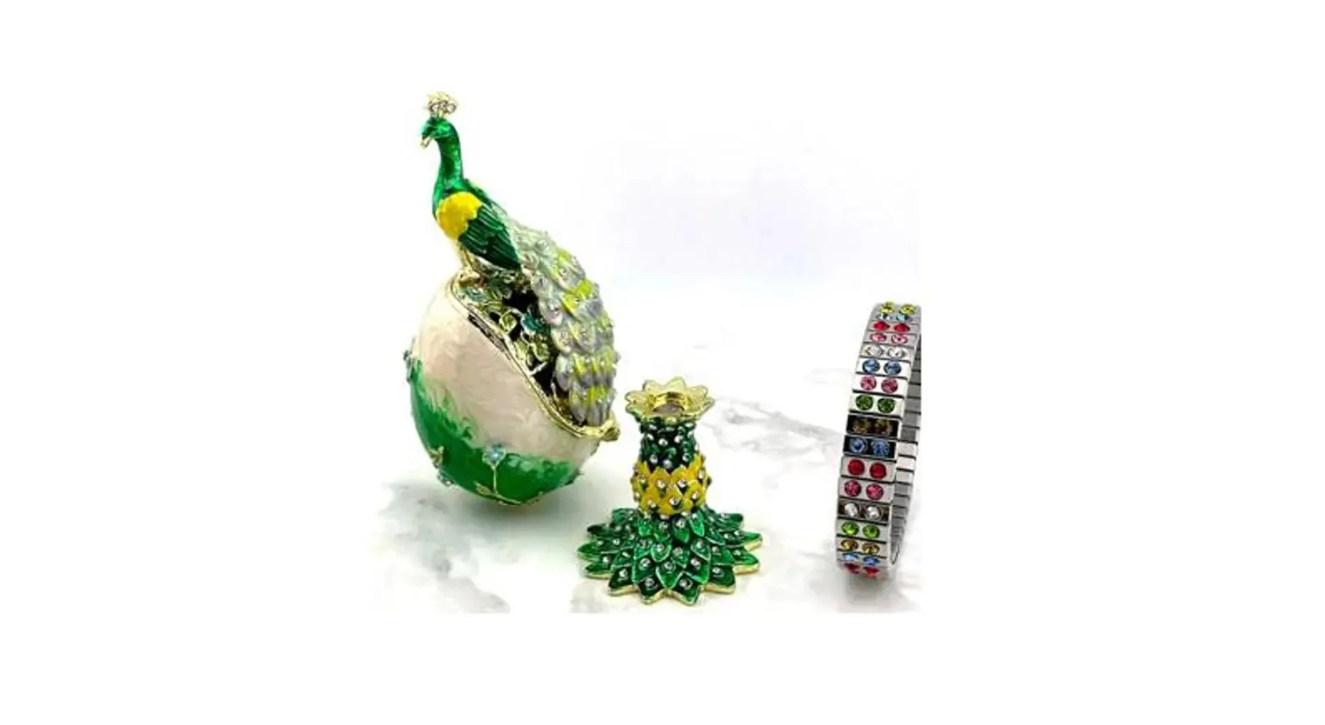 PEACOCK  Designr Green Faberge Easter Eggs in the Russian Faberge style, featuring Swarovski elements and pure gold decoration. This handmade piece makes a perfect graduation luck gift for your daughter by Pierre Lorren.