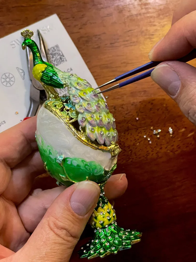 PEACOCK  Designr Green Faberge Easter Eggs in the Russian Faberge style, featuring Swarovski elements and pure gold decoration. This handmade piece makes a perfect graduation luck gift for your daughter by Pierre Lorren.