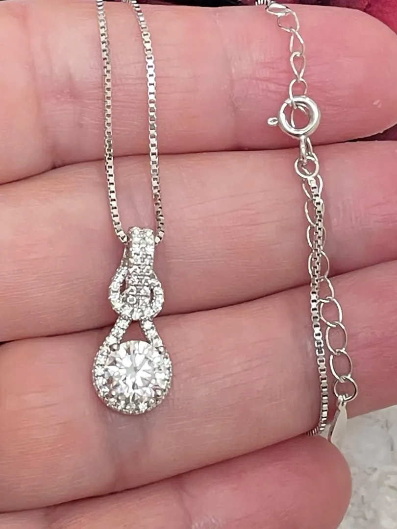 4.2ctw Certified Love Knot Diamond Jewelry Set: Diamond Pendant Necklace, Diamond Screwback Earrings, and Diamond Studs for Women in 18k Gold and Silver.