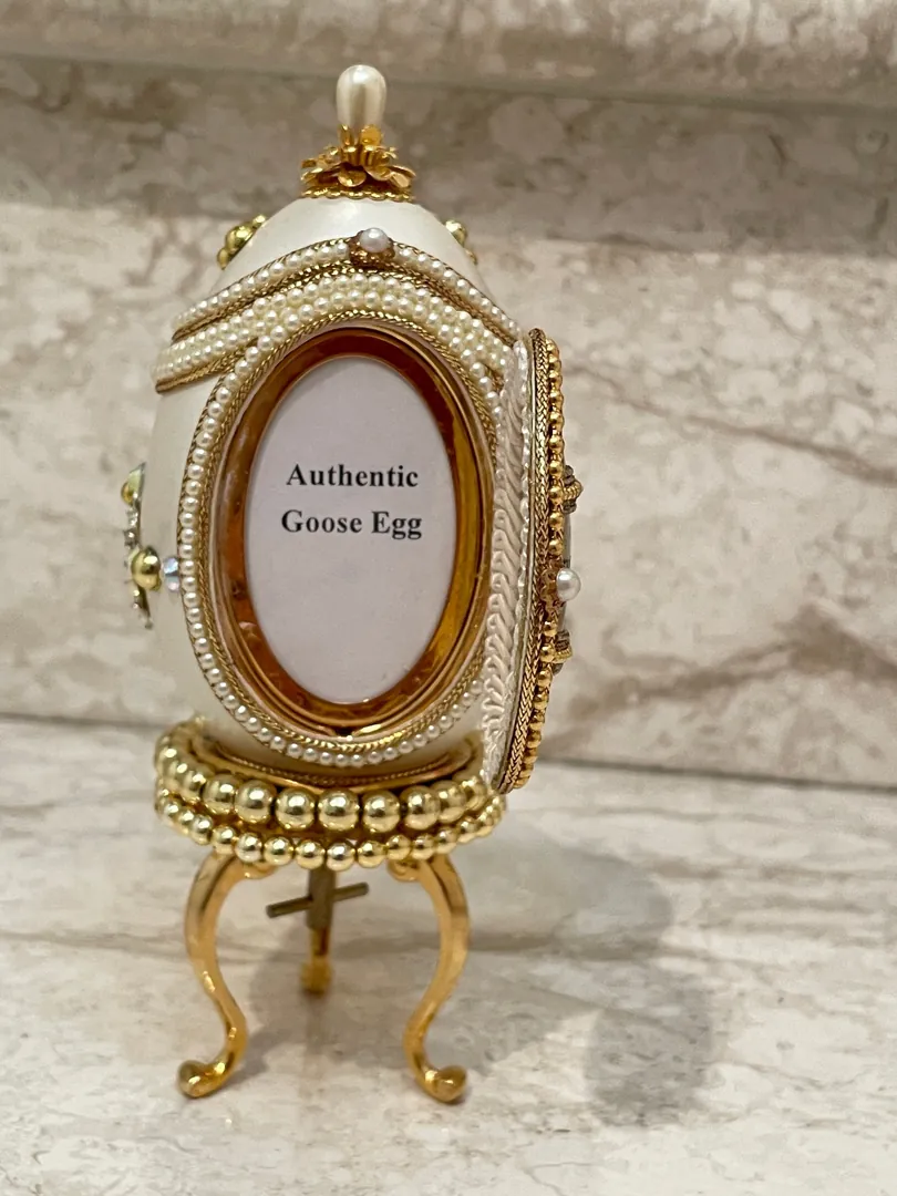 ONE OF A KIND Faberge Egg Jewelry Box for Daughter Wedding Day Gifts. This collectible item features Swarovski handset details and is designed in the Fabergé egg style. It comes with a natural hand-carved egg.