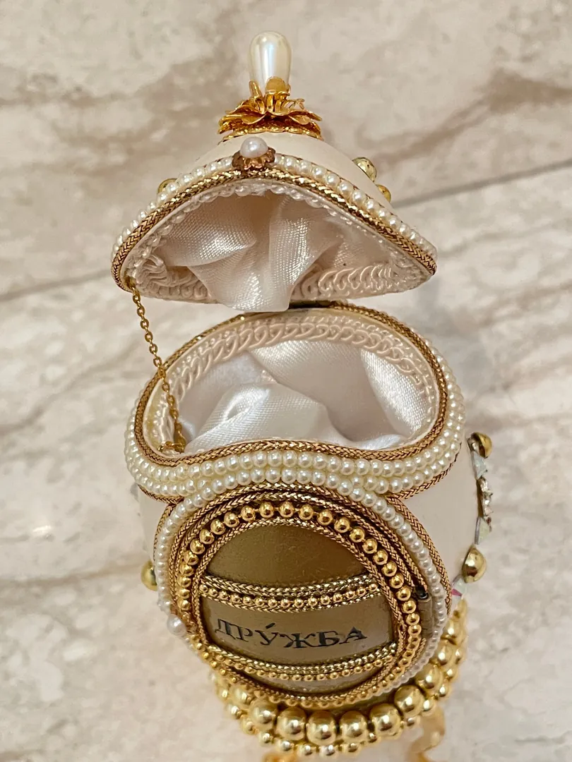 ONE OF A KIND Faberge Egg Jewelry Box for Daughter Wedding Day Gifts. This collectible item features Swarovski handset details and is designed in the Fabergé egg style. It comes with a natural hand-carved egg.