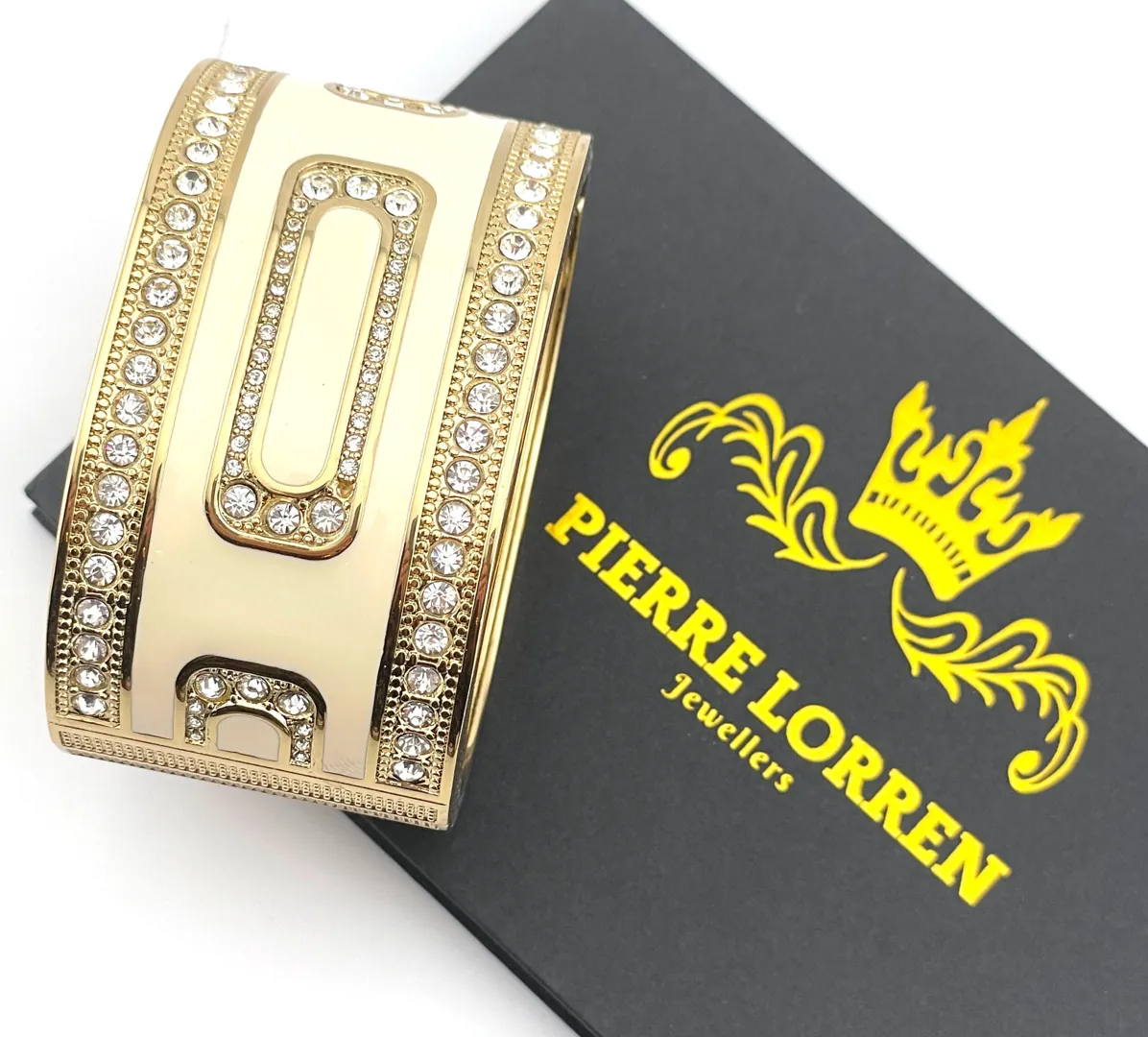 Pierre Lorren Greek Key Infinity Bracelet: Success, Eternal Life. Greek key jewelry featuring an ancient Greek design. Greek bracelet bangle made of 18k gold and silver.